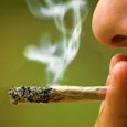 Closeup of a mother smoking pot