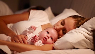 Mother co-sleeping with her baby reluctantly 