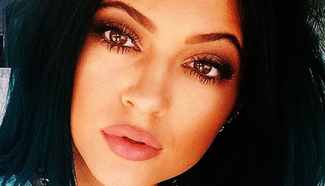 Kylie Jenner posing for a selfie with light natural makeup on