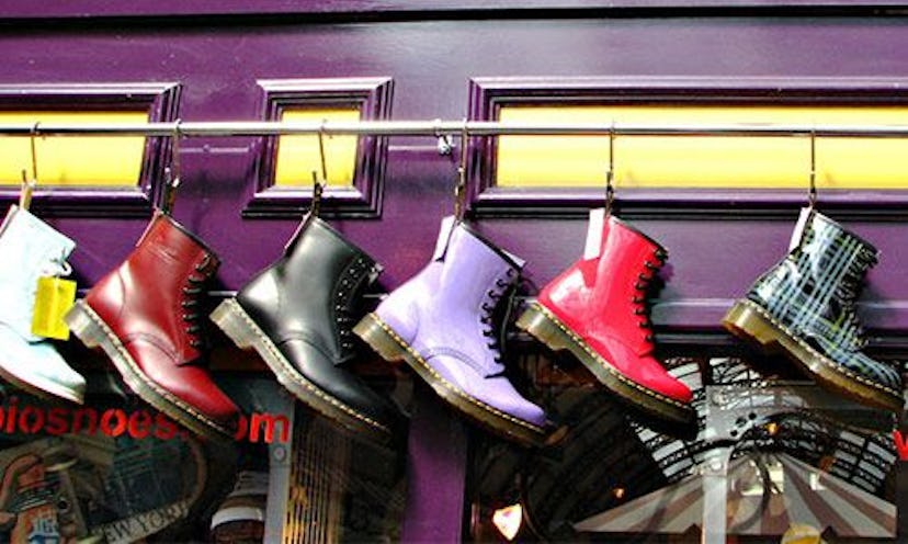 Doc Martens in all colors hanging on the wall