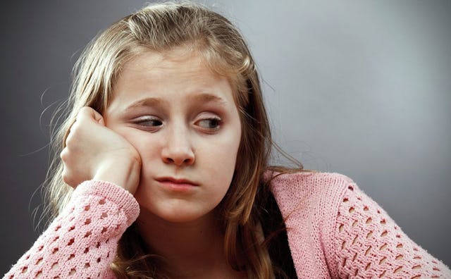 A girl experiencing tween moodiness