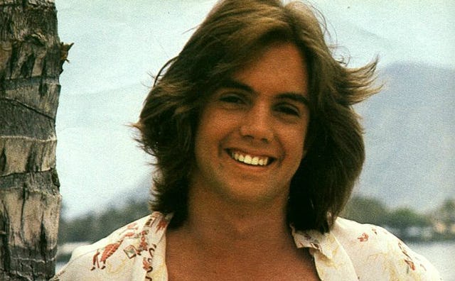 Jack Wild, the star of the 1970s American television series "H.R. Pufnstuf," wearing a smile.
