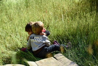 two children hugging each other