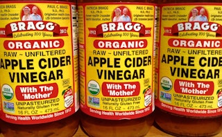 Three bottles of apple cider vinegar