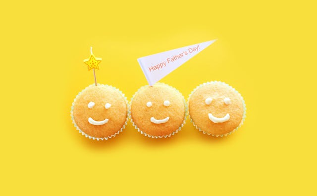Three yellow cupcakes shaped as smileys