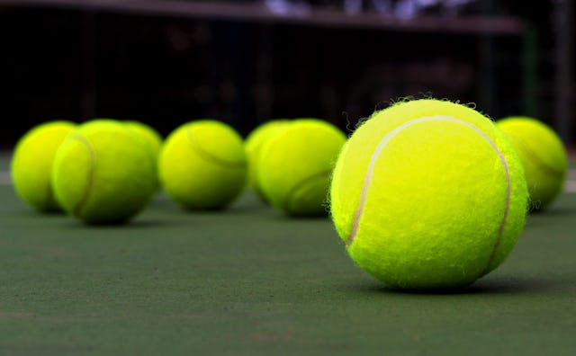 Tennis balls on the ground 