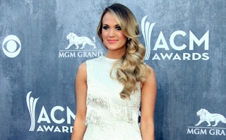 Carrie Underwood in a white dress at the ACM Awards