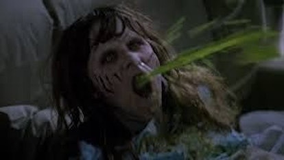 A scene from the Exorcist where the scary creature spews green liquid.