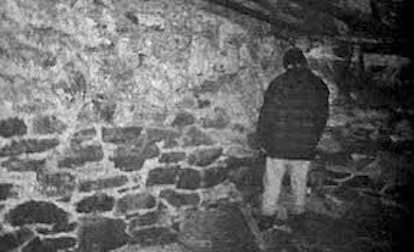 The Blair Witch Project scene where the man stands in a corner and doesn't respond while the woman i...