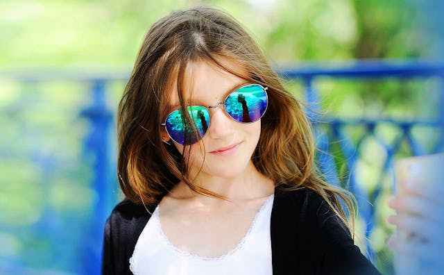 A Teen Girl Wearing Colorful Sunglasses