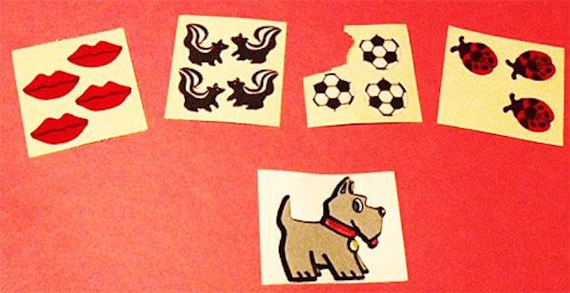 A collection of fuzzy stickers: red lips, skunks, soccer balls, ladybugs and the Scotty dog.