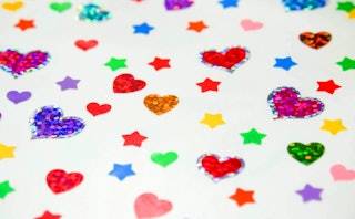 Sparkling hearts and stars stickers in various colors on a white background