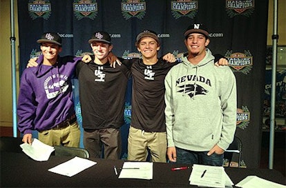 Four college students after signing the baseball contract