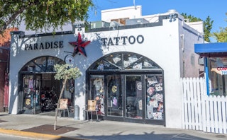The exterior of the Paradise tattoo studio.