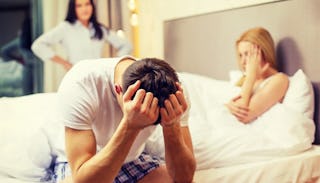 Husband, wife, and nanny together in a bedroom