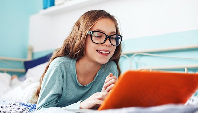 preteen-girl-with-laptop