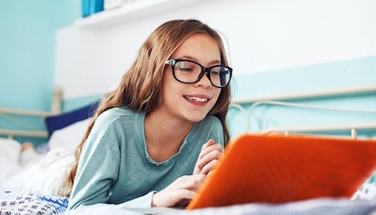preteen-girl-with-laptop