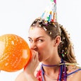 annoyed-woman-inflating-balloon