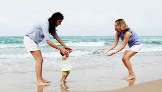 two-women-playing-with-toddler