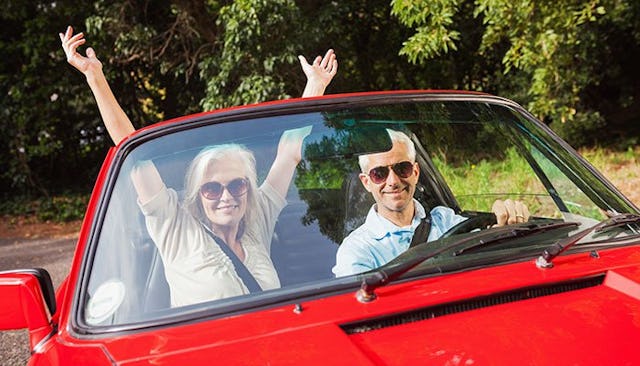 middle-age-couple-in-convertible