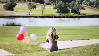 lonely-woman-with-balloons