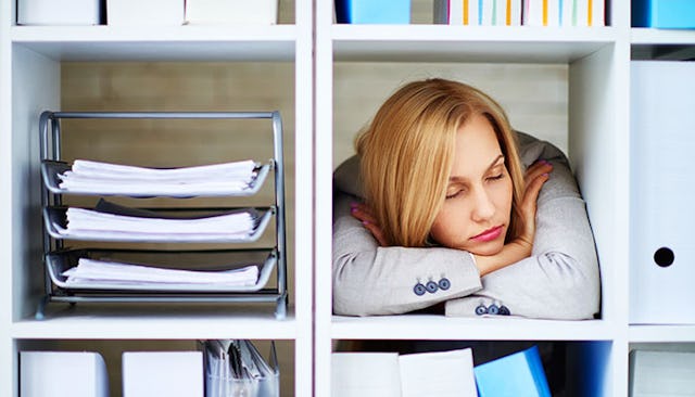 woman-sleeping-in-office