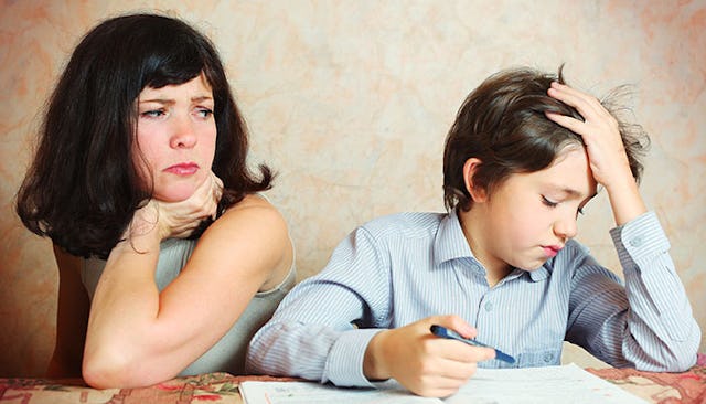 unhappy-mother-son-doing-homework