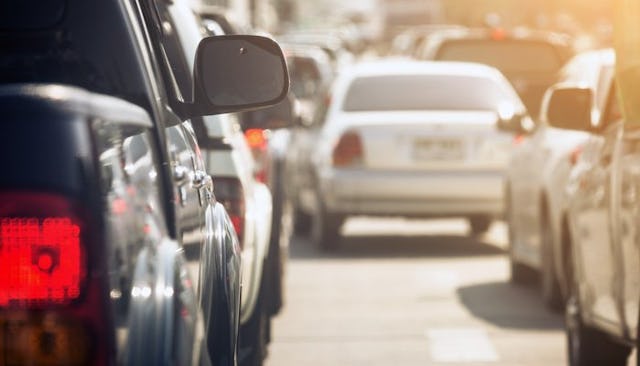 A lot of cars in a line during a traffic jam
