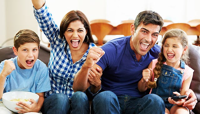 family-watching-football