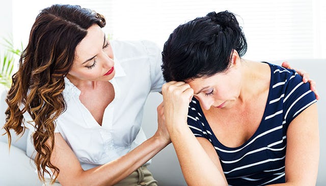 woman-comforting-friend