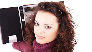 woman-holding-cd-player