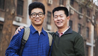 smiling-father-and-teen-son