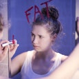 unhappy-teen-labeling-herself-fat
