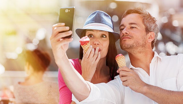 male-female-friend-taking-selfie