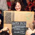 A woman dressed as a box of wine for Halloween