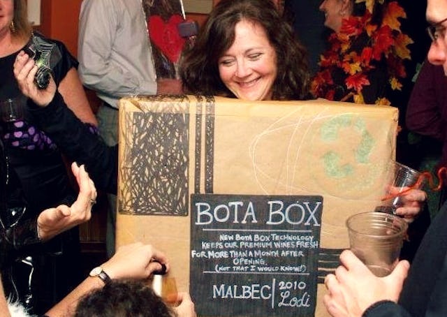 A woman dressed as a box of wine for Halloween