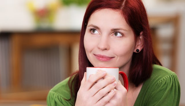 Mom fantasying while drinking a tea