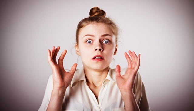 A surprised young blonde girl