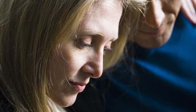 A woman looking worried as her marriage starts to feel heavy