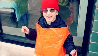 An autistic boy in his Halloween costume