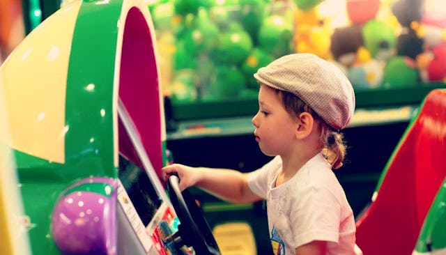Little kid playing in the playroom