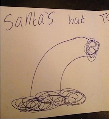 funny-kid-drawing-santa-hat