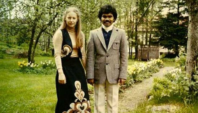 PK Mahanandia and his wife Charlotte Von Schedvin for whom he biked 4,000 miles to be with standing ...