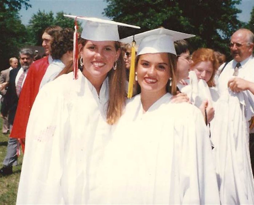 Best friends at their high school graduation 