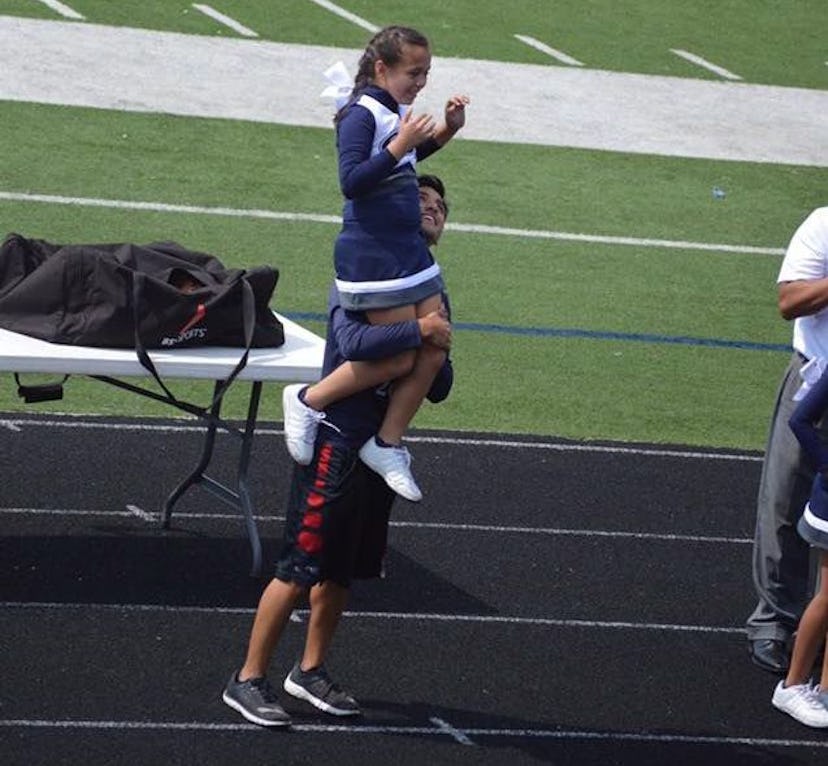 student rescues cheerleader