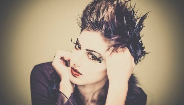 An '80s Teenager with extravagant make up