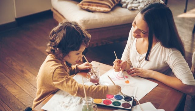 A mother who's learning about her child's unbridled creativity and her kid drawing and painting toge...
