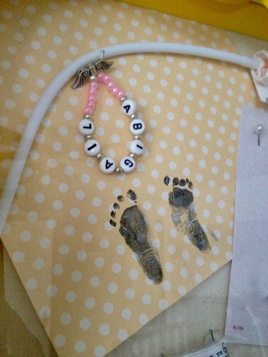 A lost child's bracelet and footprints