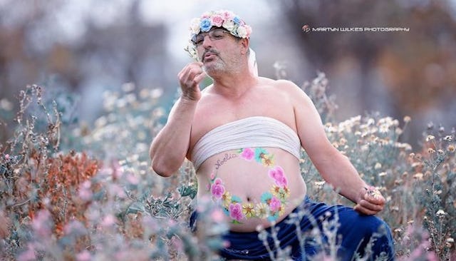 Dad's maternity photo where he is frollicking in a field of flowers