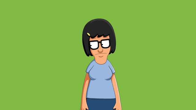 The cartoon character Tina Belcher in a blue shirt and navy trousers with a green background